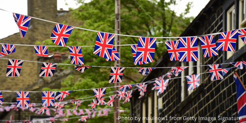 Lots of little Union Jacks hanging outside in the air