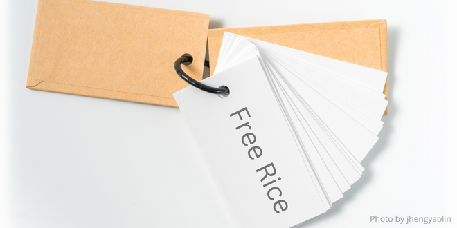 White index cards on a ring. One has the words "Free Rice" on it.