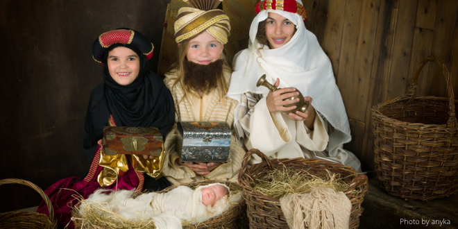 Children dressed up as the three wise men in a nativity play