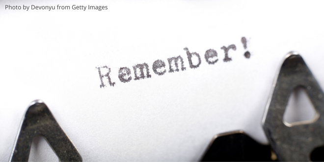 A typewritten note in a typewriter with the words "Remember!"