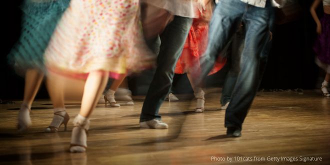 a blurred photo of people dancing