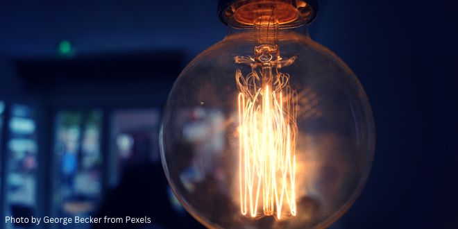 A close-up of a big, round light bulb