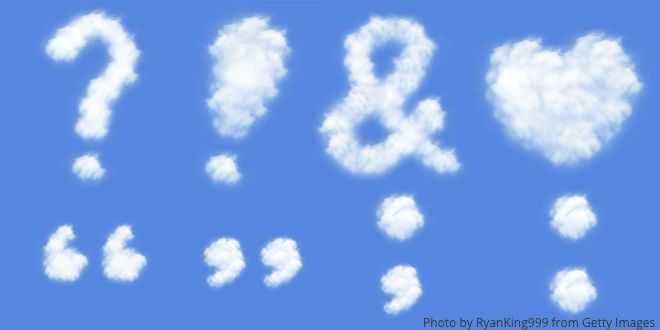 Punctuation marks that look like clouds or cotton wool against a blue sky