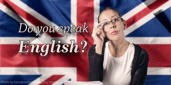 A young woman sitting in front of the Union Jack and the words, "Do you speak English?"