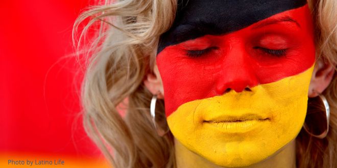 A female face with the German flag painted on it