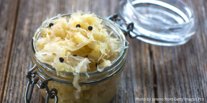 Sauerkraut in a glass jar with a lid