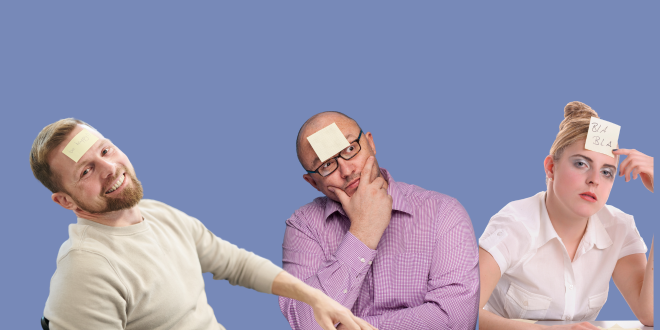 Two men and one woman with a Post-It stuck to their foreheads